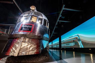Chicago museum train ‘speeds past’ 170ft projection wall